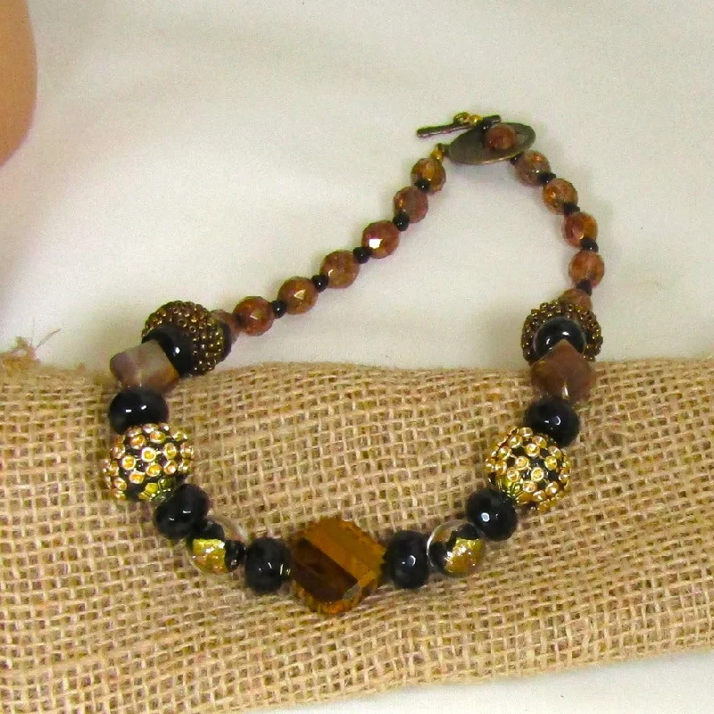 Best necklaces and pendants with opal and gold for a vibrant, luxurious contrast-Funky Fun  Bead Black and Gold Beaded Necklace