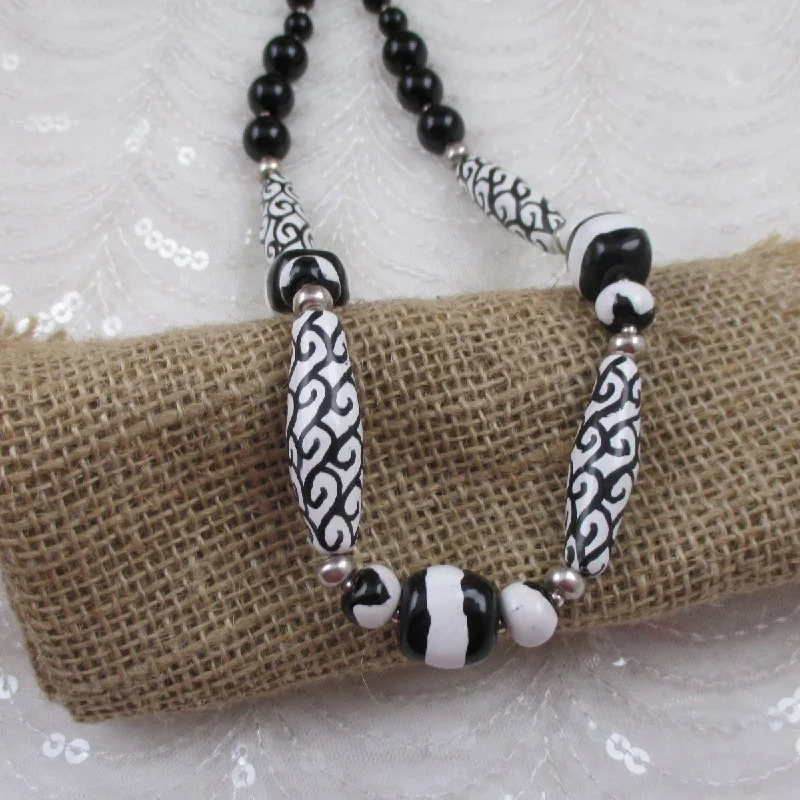 Best necklaces and pendants with intertwined designs for a symbol of unity-Handmade Black and White Kazuri Bead Necklace