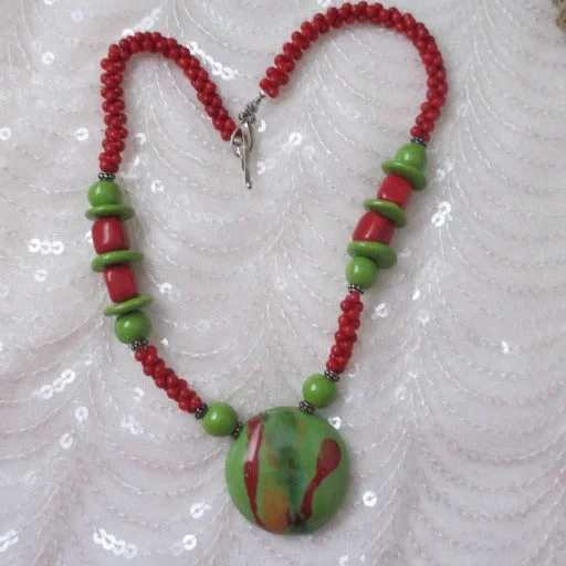 Necklaces and pendants with feather designs for a boho-chic, carefree vibe-Red & Green Handmade Kazuri Bead Pendant Necklace