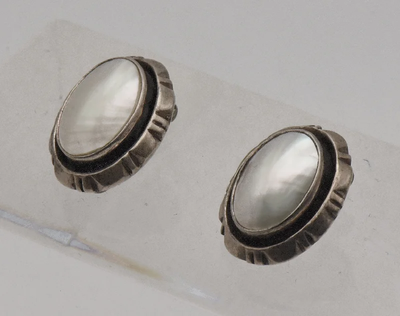 Best hoop earrings with vintage rhinestone embellishments for a retro-glam effect-Carol Felley - Vintage Sterling Silver Mother of Pearl Clip On Earrings